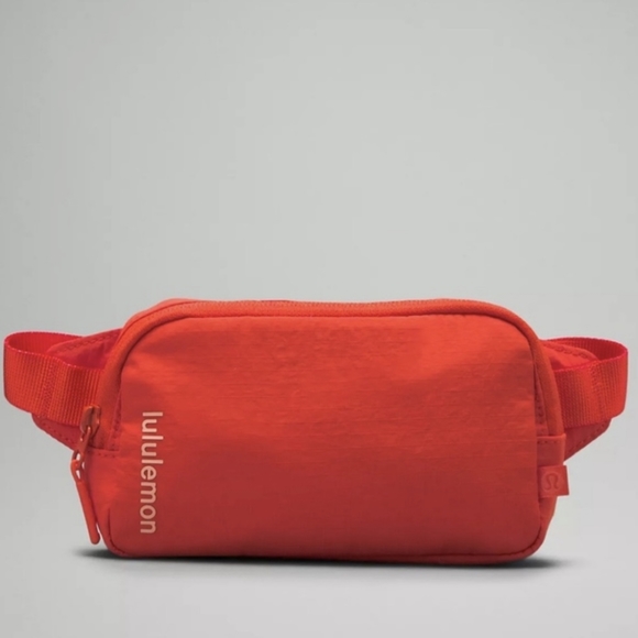 lululemon athletica Handbags - NWT!! Lululemon Mini Belt Bag in Solar Orange